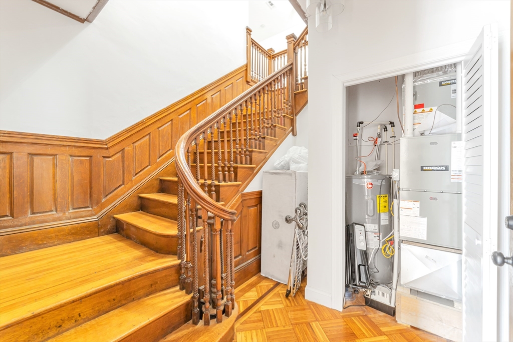 36 Brookledge Street Boston, MA 02121 - Photo 24 of 31 a view of entryway and hall with wooden floor