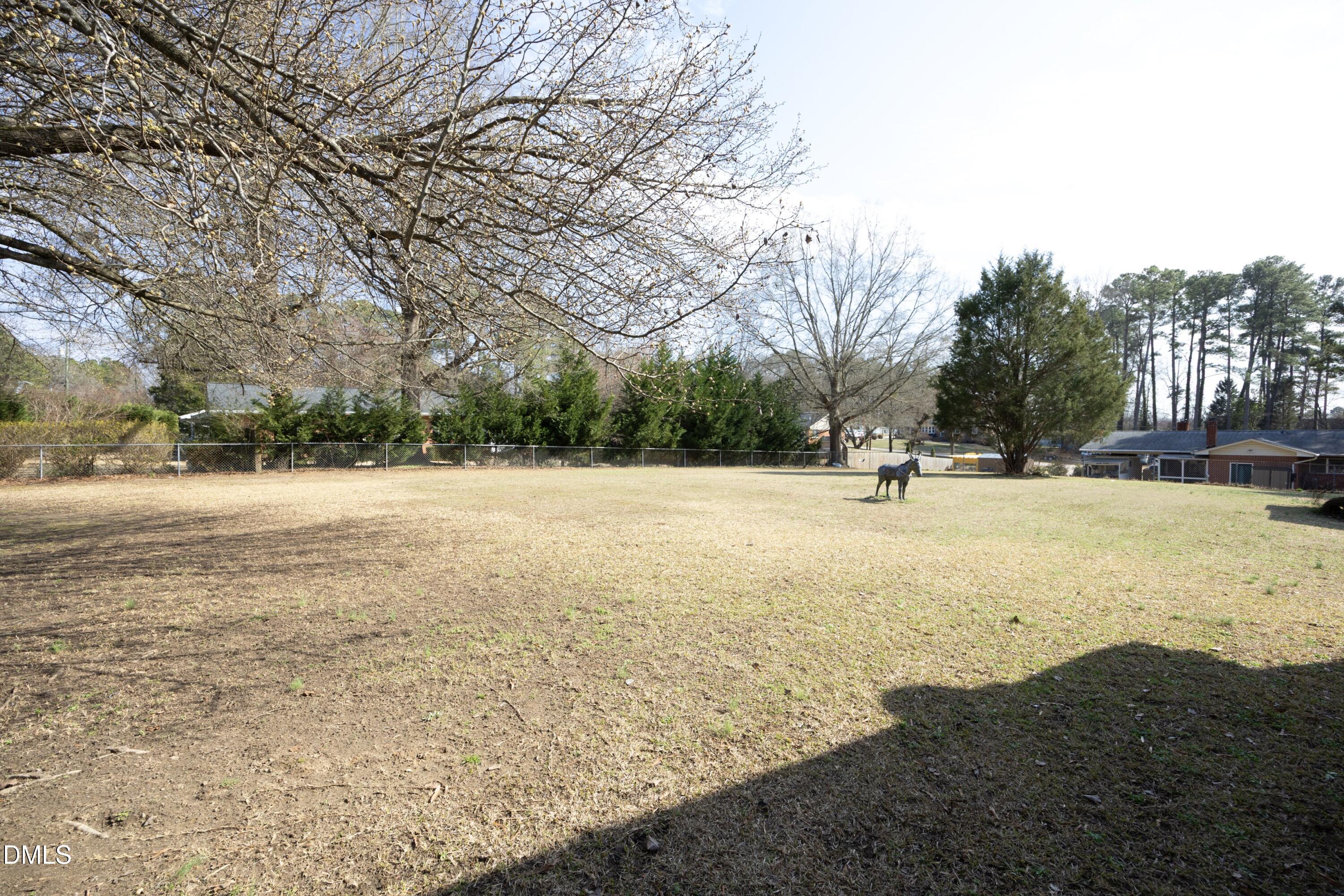 3504 Skycrest Drive Raleigh, NC 27604 - Photo 2 of 10 a view of road with yard