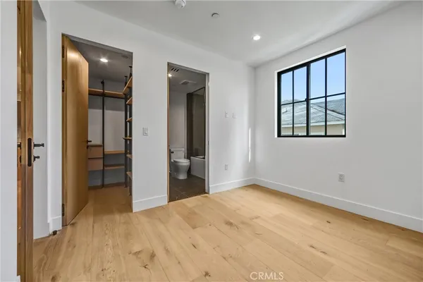 an empty room with a empty space and window