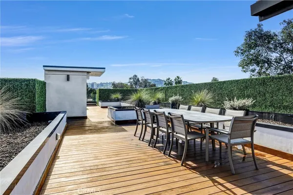 a view of swimming pool with outdoor seating