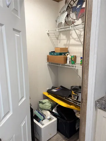 a room with storage and utility