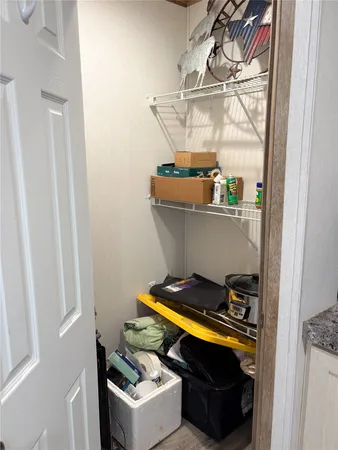 a room with storage and utility