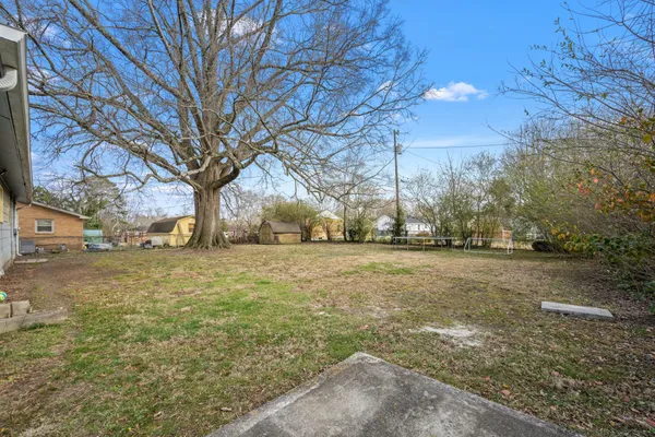 a view of large space with green space