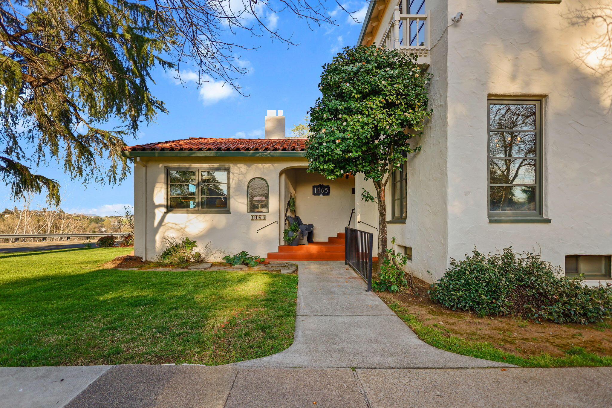 1465 Riverside Drive Redding, CA 96001 - Photo 50 of 163 a front view of a house with a yard