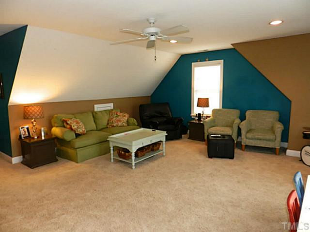 343 Ina Joe Place Willow Spring, NC 27592 - Photo 19 of 23 a living room with furniture and a window