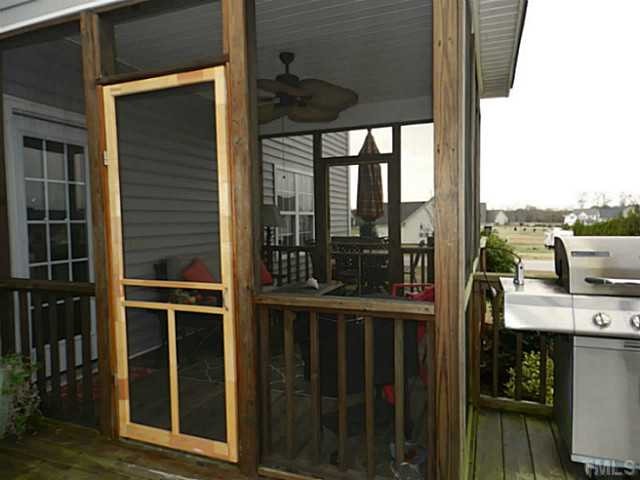 343 Ina Joe Place Willow Spring, NC 27592 - Photo 20 of 23 a view of a balcony with chairs