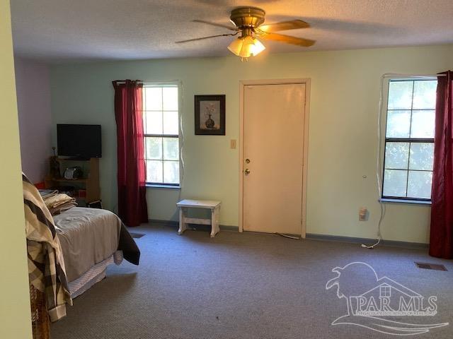 5998 Gillum Road Milton, FL 32570 - Photo 8 of 22 Upstairs master suite with open deck