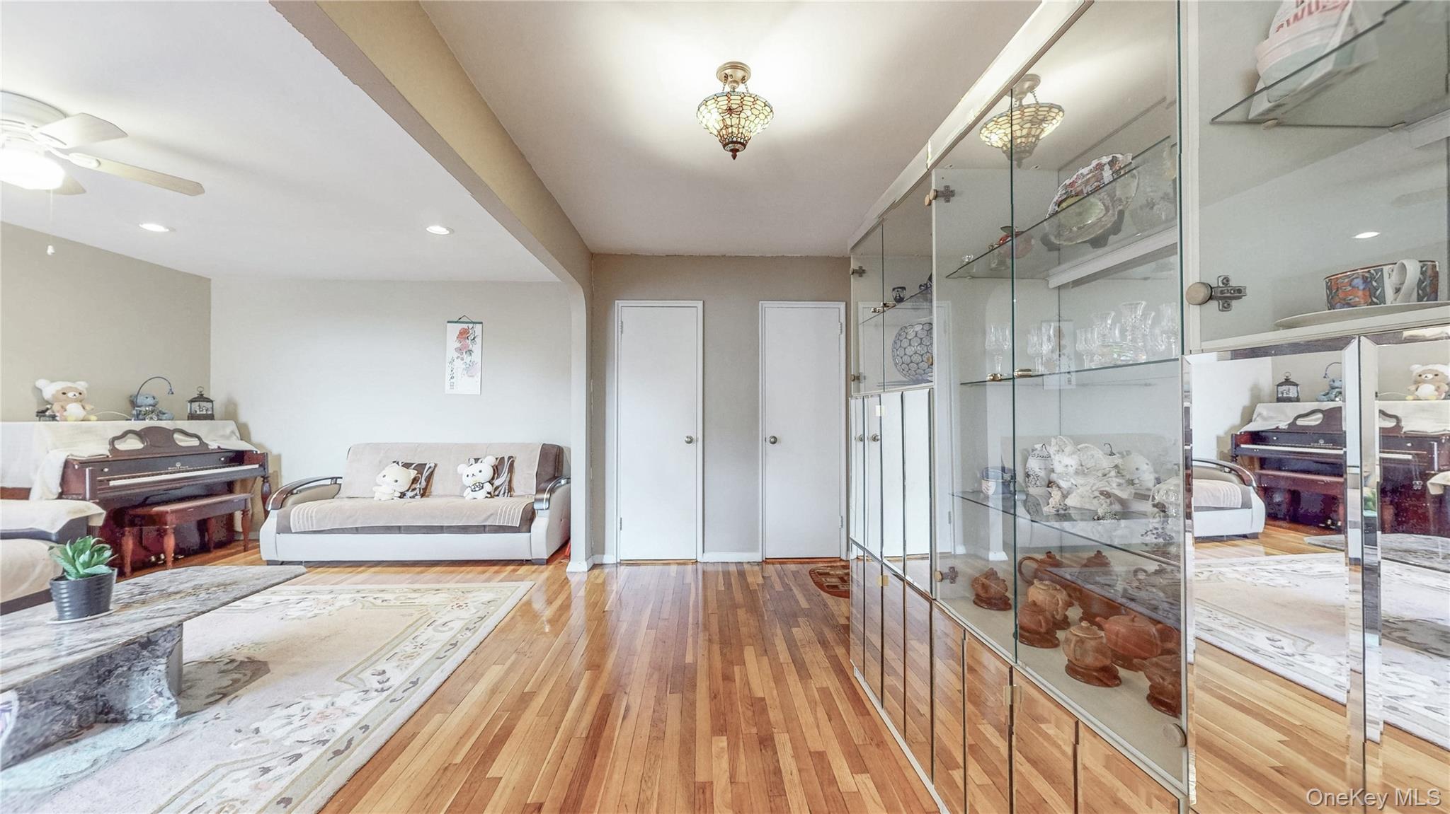 67-40 Booth Street, Unit 4O Queens, NY 11375 - Photo 8 of 19 a spacious bedroom with a bed and a walk in closet