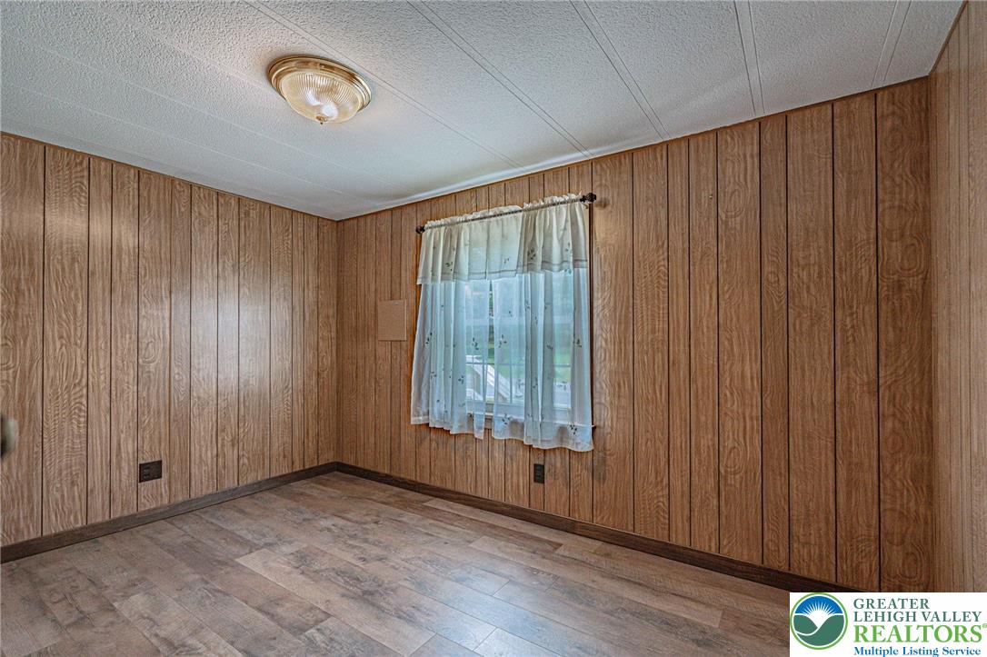3310 Friedens Road Slatington, PA 18080 - Photo 19 of 41 wooden floor in an empty room with a window