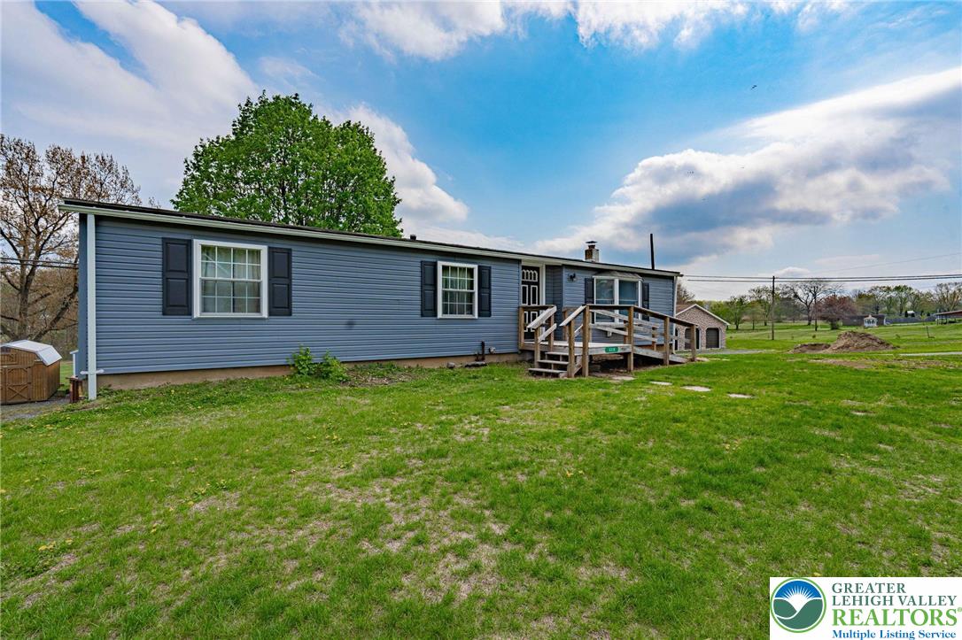 3310 Friedens Road Slatington, PA 18080 - Photo 3 of 41 a front view of a house with garden
