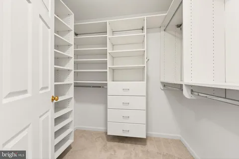 a view of an empty walk in closet