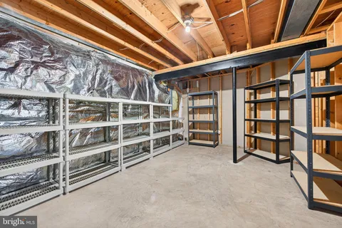 a view of an empty room with shelves