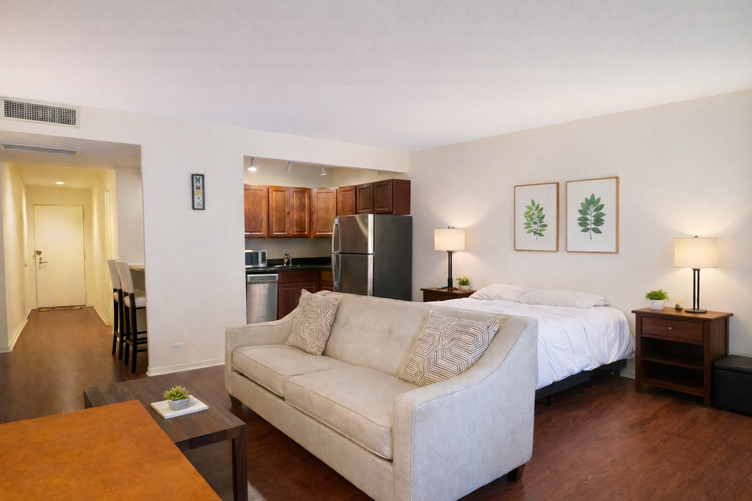 260 East Chestnut Street, Unit 606 Chicago, IL 60611 - Photo 11 of 26 a spacious bedroom with a bed and a couch