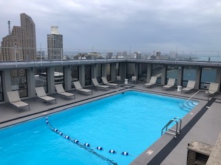 260 East Chestnut Street, Unit 606 Chicago, IL 60611 - Photo 18 of 27 a view of a swimming pool with outdoor seating