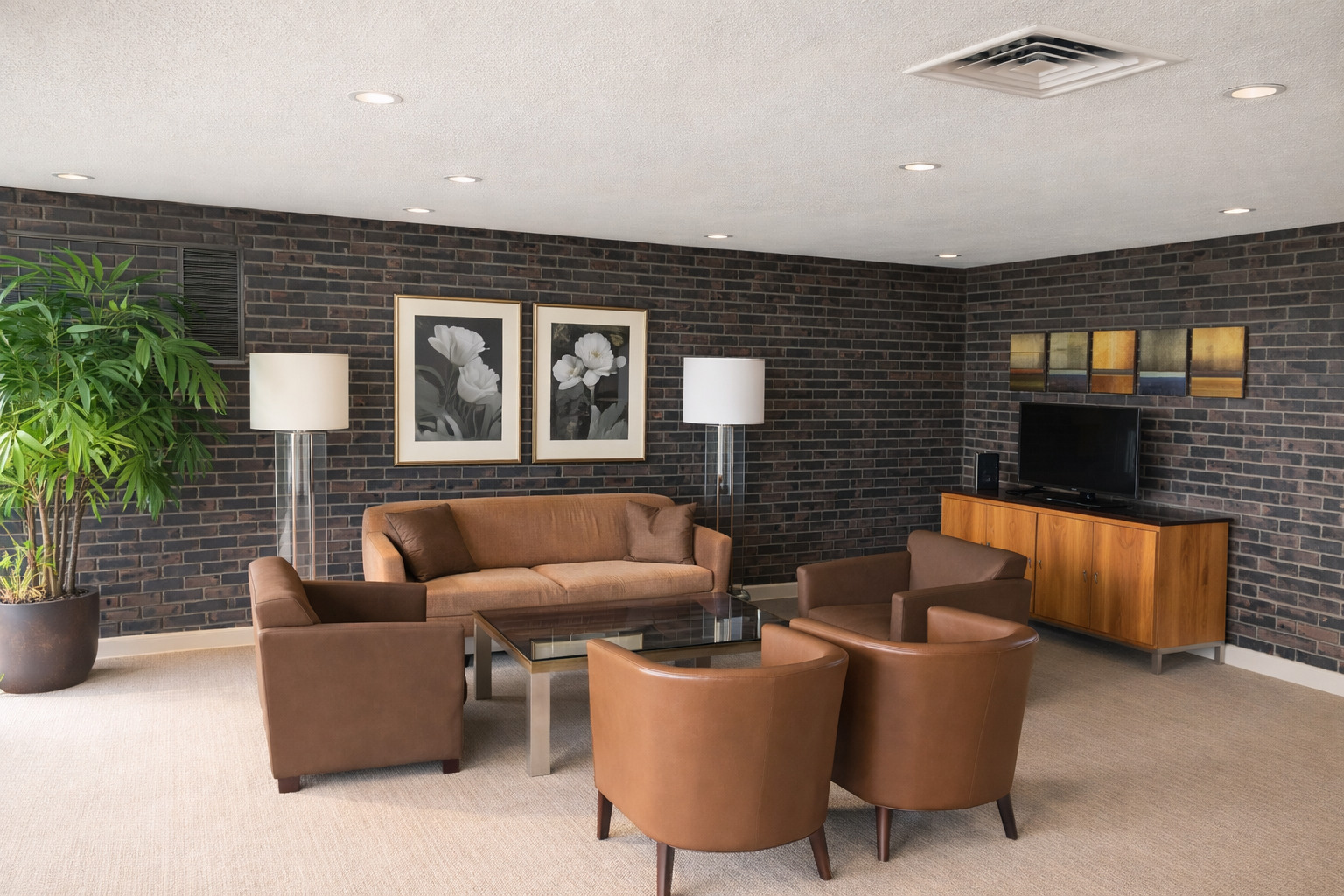 260 East Chestnut Street, Unit 606 Chicago, IL 60611 - Photo 20 of 26 a living room with furniture a potted plant and a fireplace