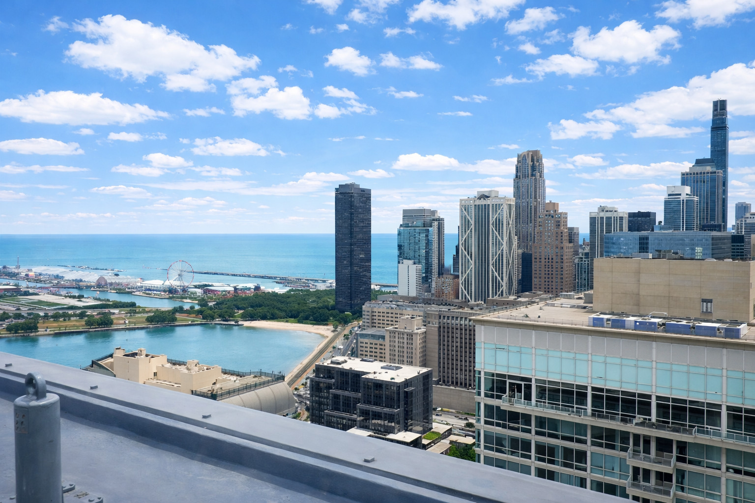 260 East Chestnut Street, Unit 606 Chicago, IL 60611 - Photo 23 of 26 a view of a city with lawn chairs