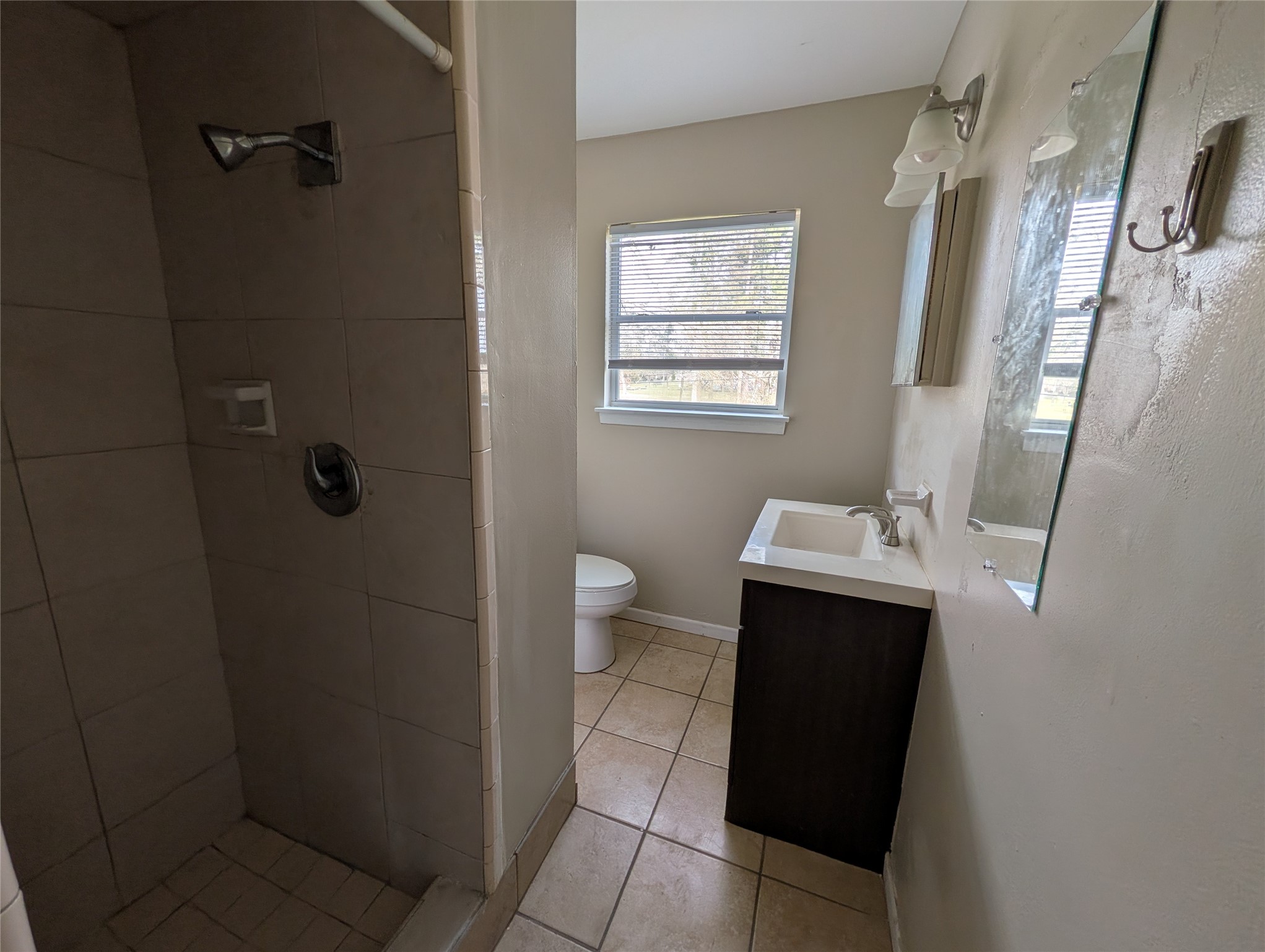 515 Broad Ripple Drive Huffman, TX 77336 - Photo 15 of 21 a bathroom with a sink a toilet and shower