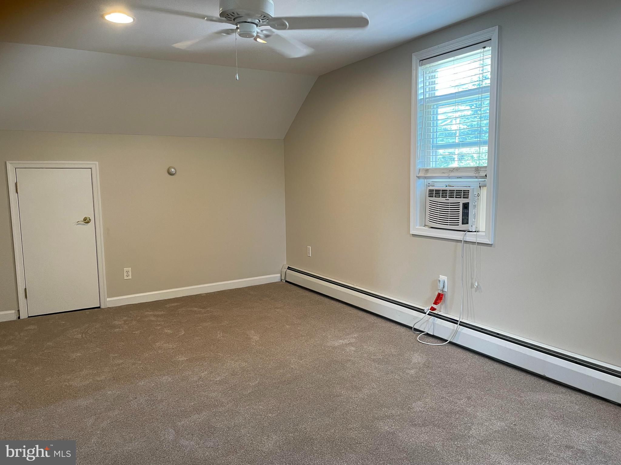 922 Overbrook Road Baltimore, MD 21239 - Photo 11 of 15 an empty room with a window