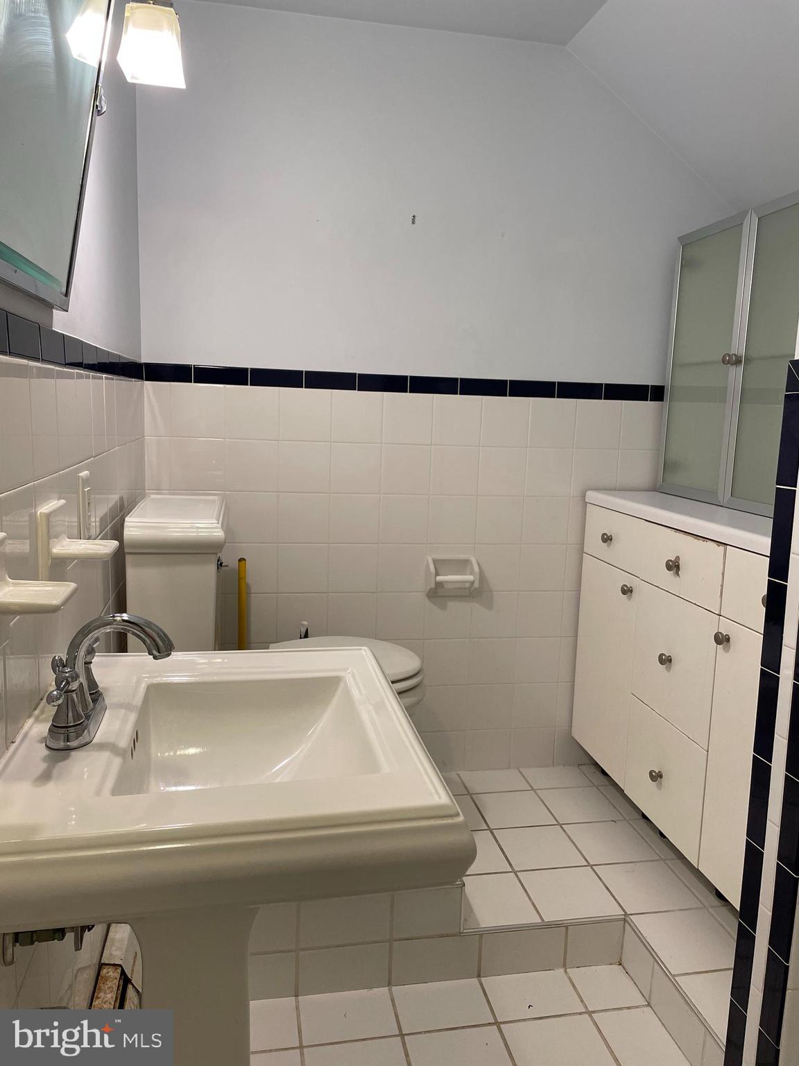 922 Overbrook Road Baltimore, MD 21239 - Photo 13 of 15 a utility room with dryer and washer