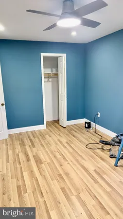 a bedroom with a bed and a view of bedroom