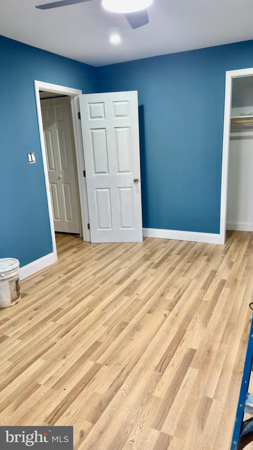 46 Boone Street Cumberland, MD 21502 - Photo 13 of 42 a view of empty room with wooden floor