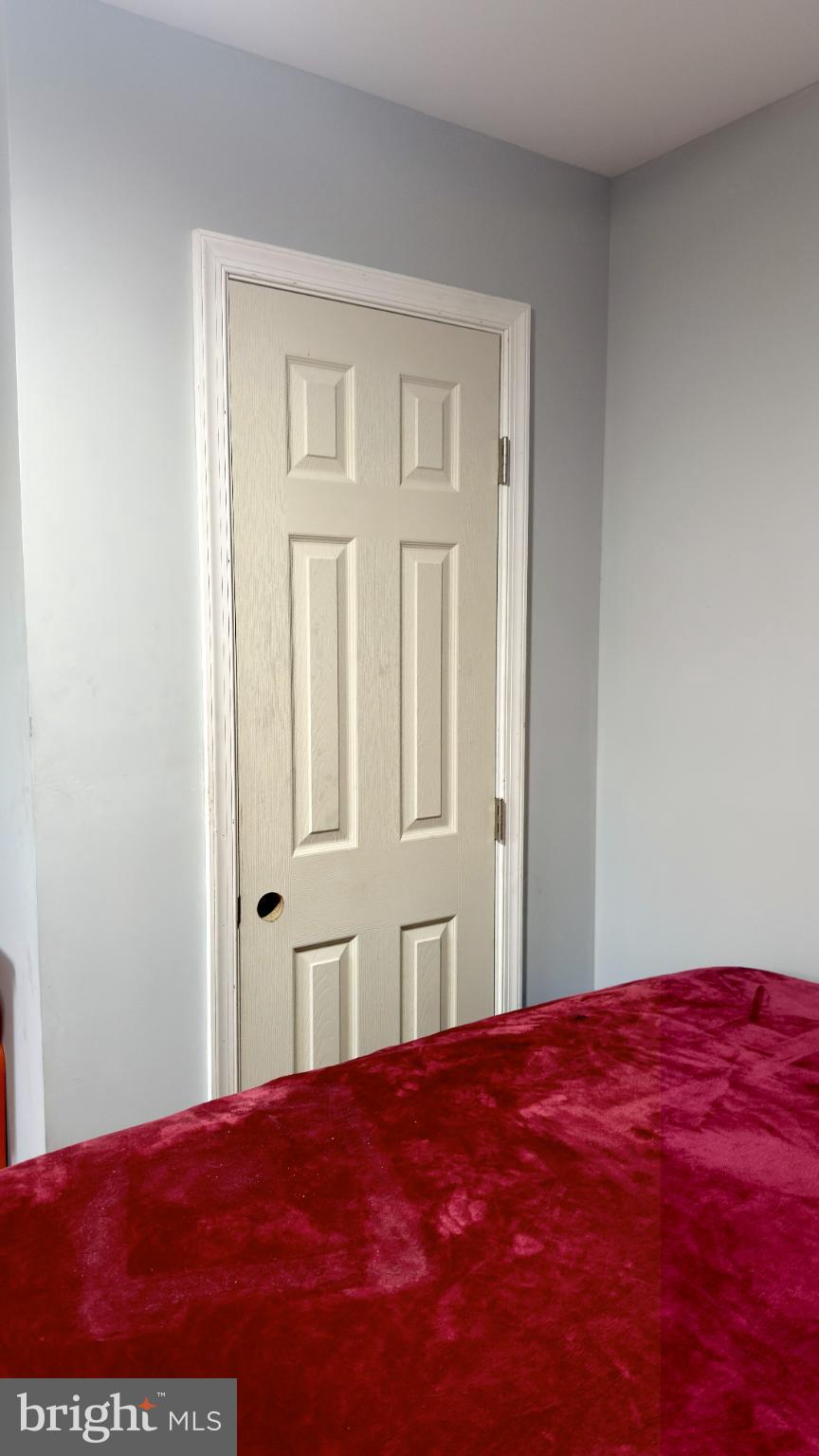 46 Boone Street Cumberland, MD 21502 - Photo 15 of 42 a bedroom with a bed and a window