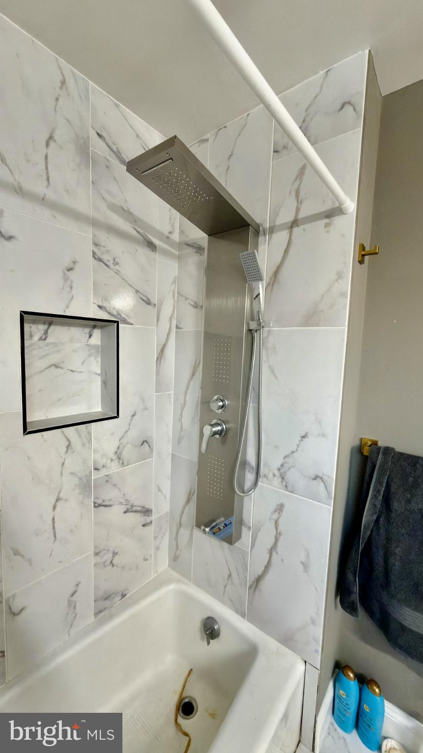 46 Boone Street Cumberland, MD 21502 - Photo 20 of 42 a bathroom with a bathtub and shower