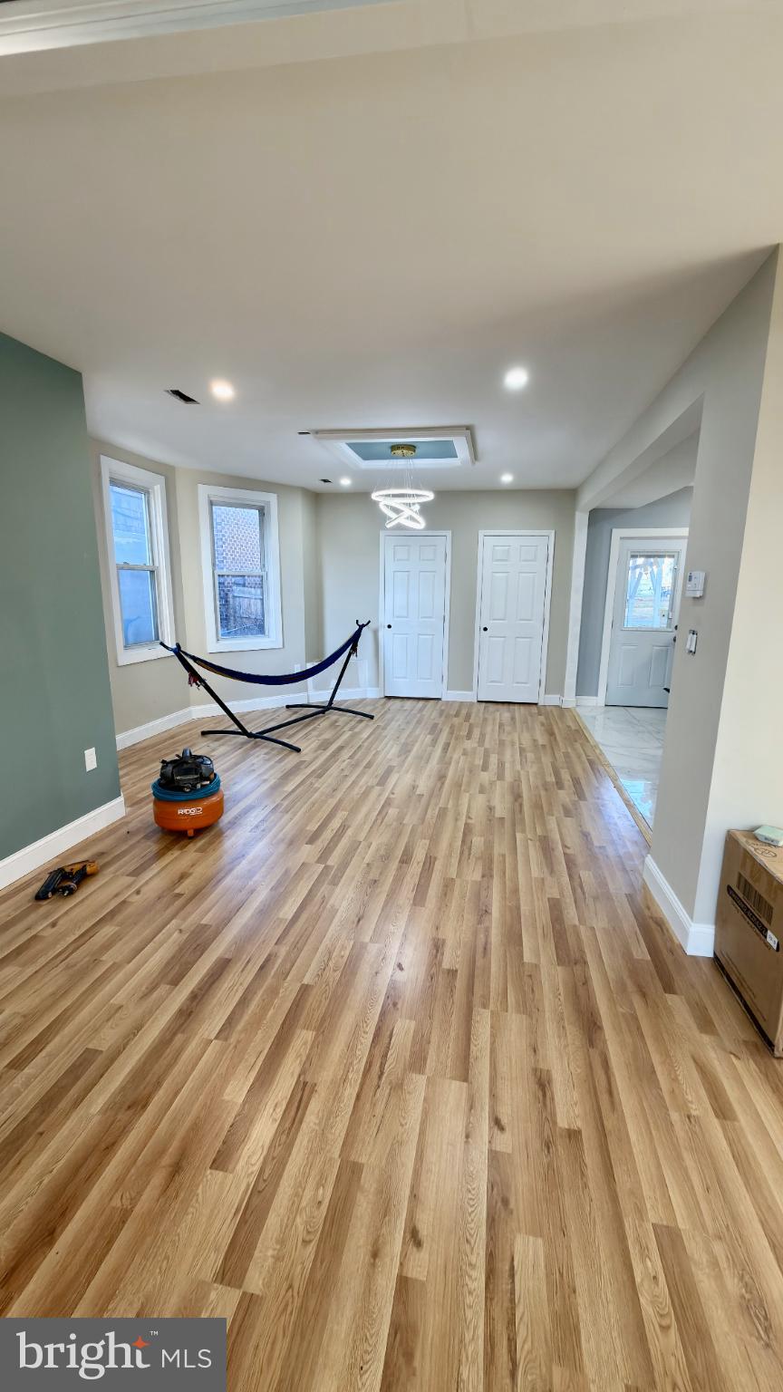 46 Boone Street Cumberland, MD 21502 - Photo 34 of 42 a view of empty room with wooden floor