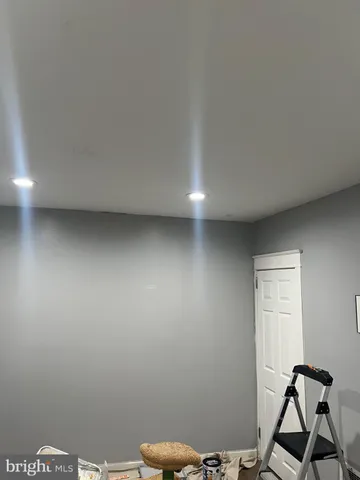 a room with furniture and a rug