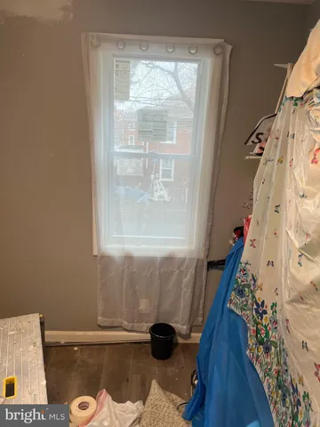 a bathroom with a shower and a shower