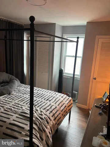 a view of a backyard with a table and chairs