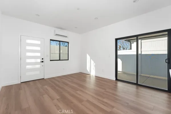 a bathroom with a toilet sink and shower