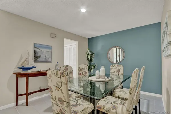 a view of a dining room with furniture