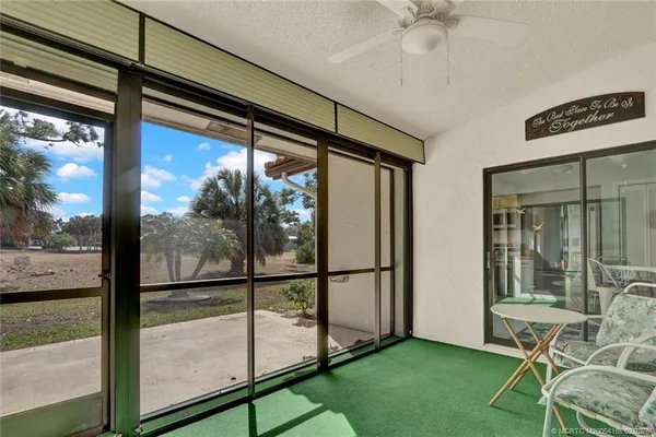a view of an entryway with a front door