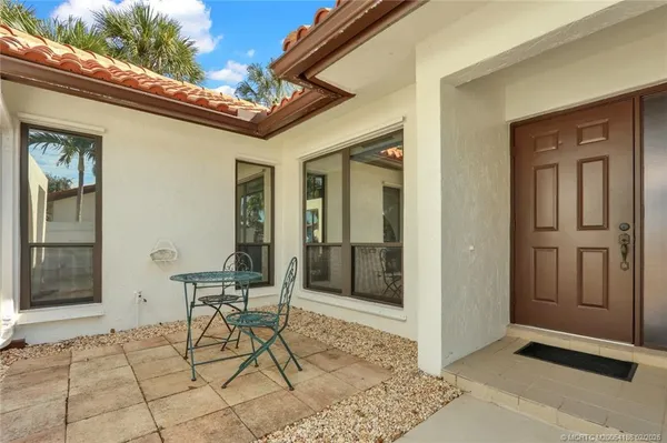 a building outdoor space with patio furniture