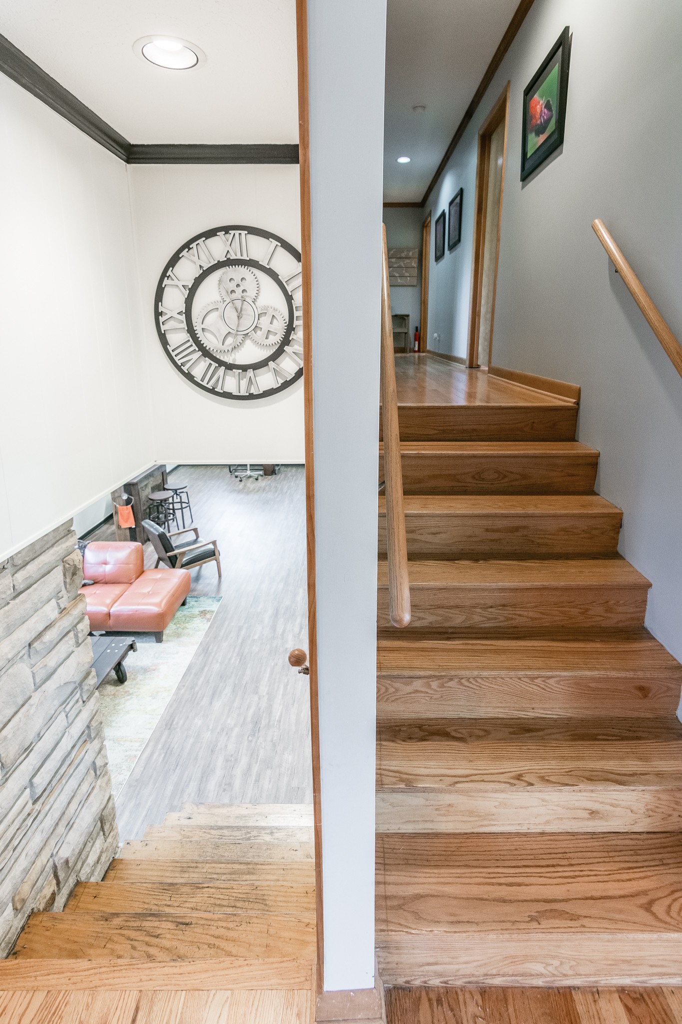 705 Ronnie Road Madison, TN 37115 - Photo 20 of 50 a view of a hallway with wooden floor and a chandelier