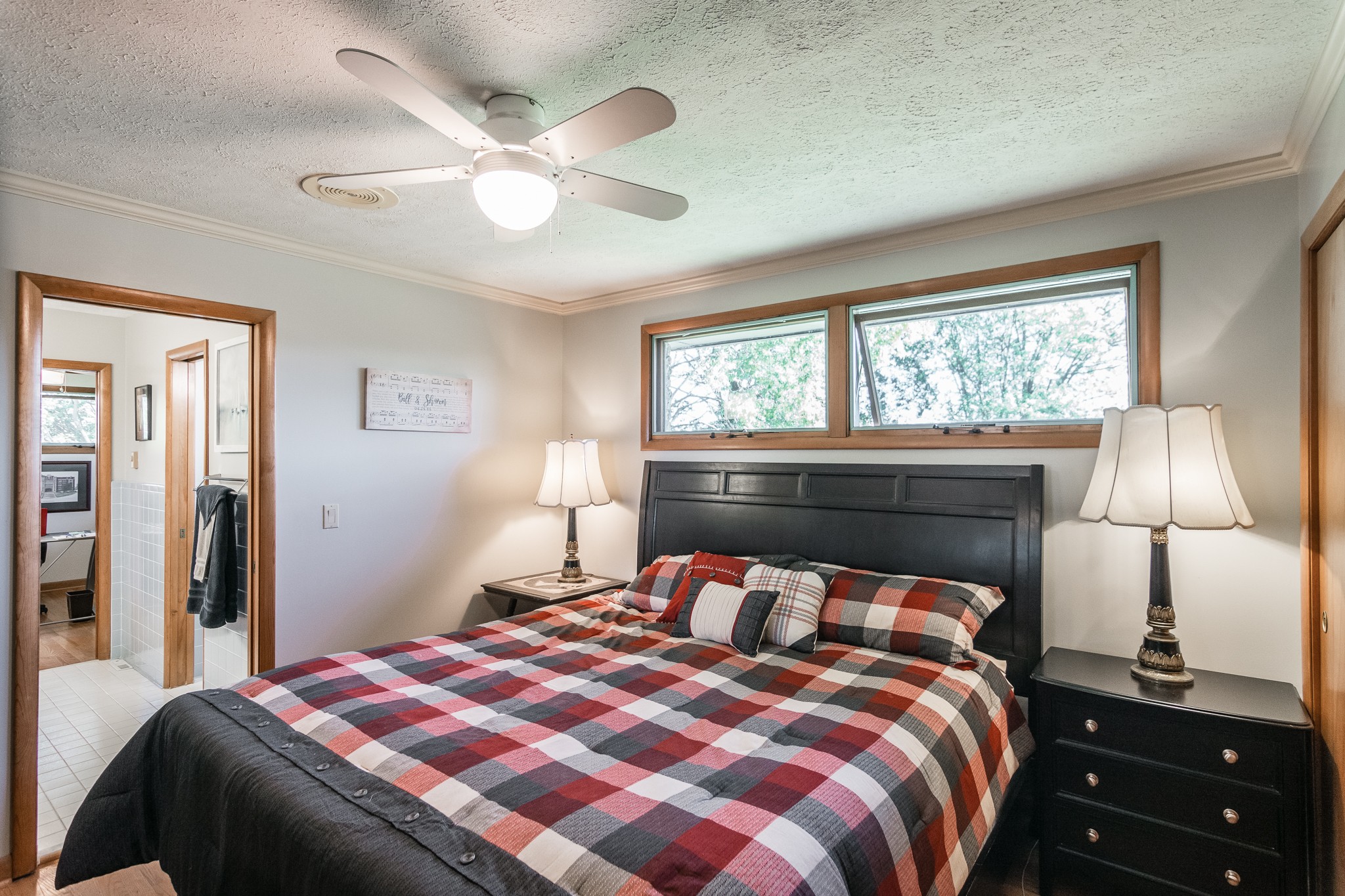 705 Ronnie Road Madison, TN 37115 - Photo 22 of 50 a bedroom with a bed and a lamp