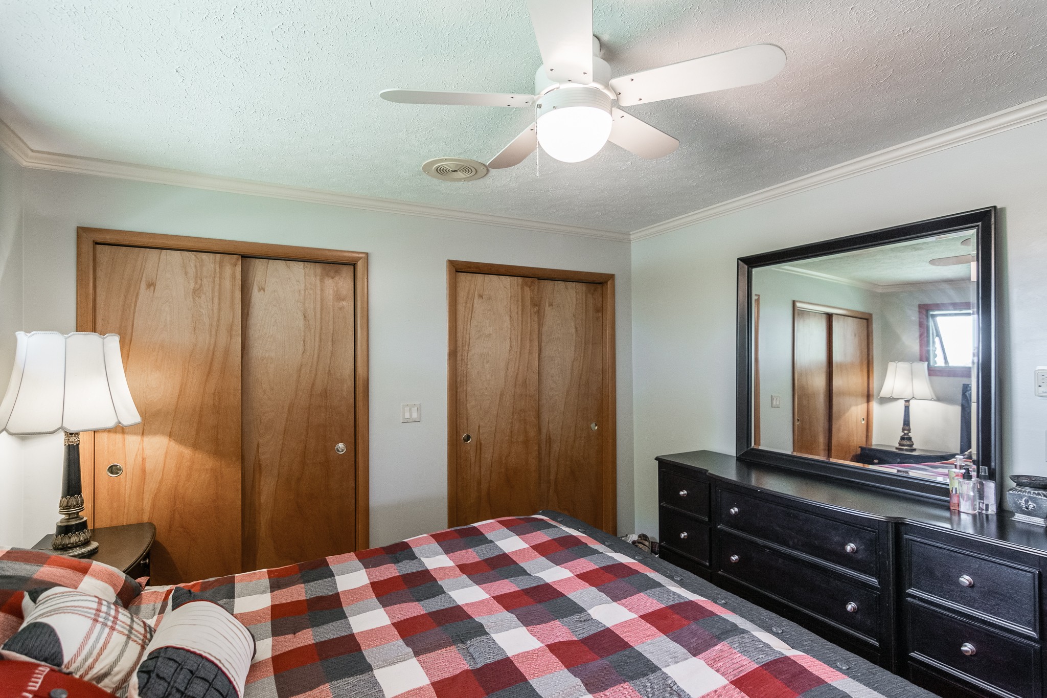 705 Ronnie Road Madison, TN 37115 - Photo 24 of 50 a bedroom with a bed and a mirror on dresser