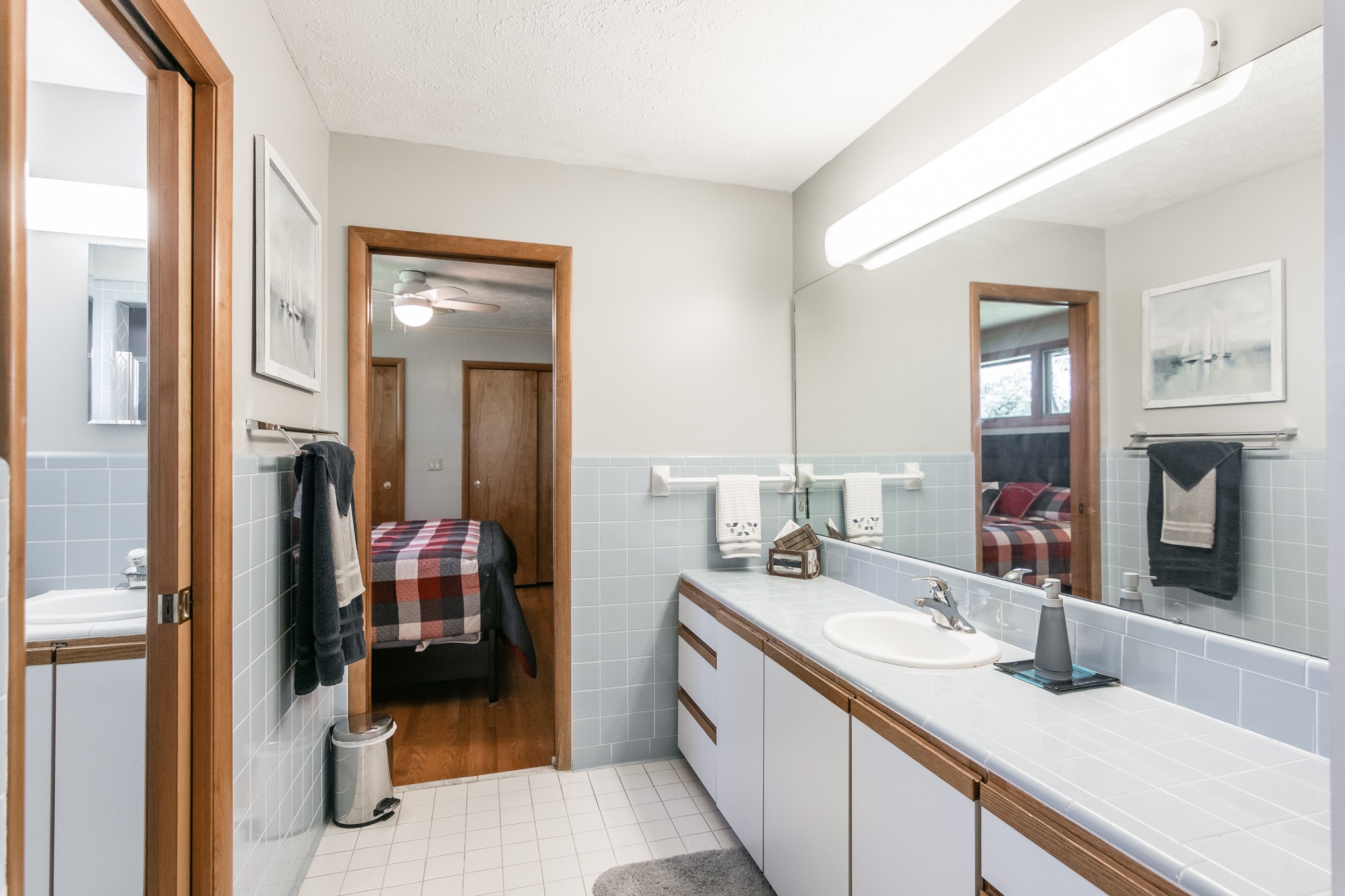 705 Ronnie Road Madison, TN 37115 - Photo 26 of 50 a en suite bathroom with a double vanity sink and a mirror