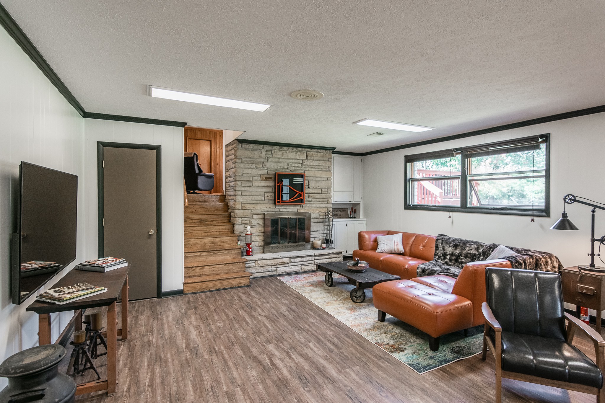 705 Ronnie Road Madison, TN 37115 - Photo 4 of 50 a living room with furniture and a flat screen tv