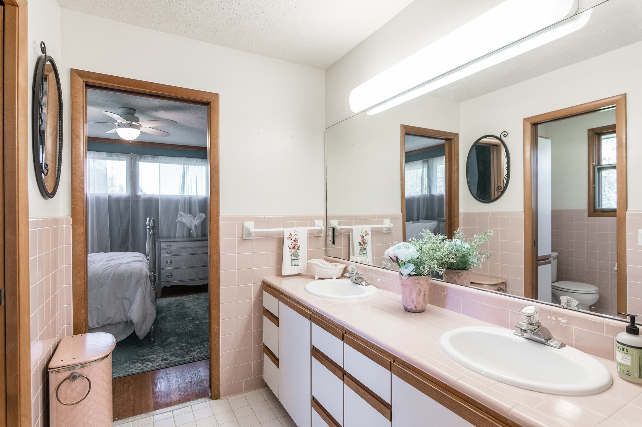 705 Ronnie Road Madison, TN 37115 - Photo 31 of 50 a bathroom with a granite countertop sink and a mirror