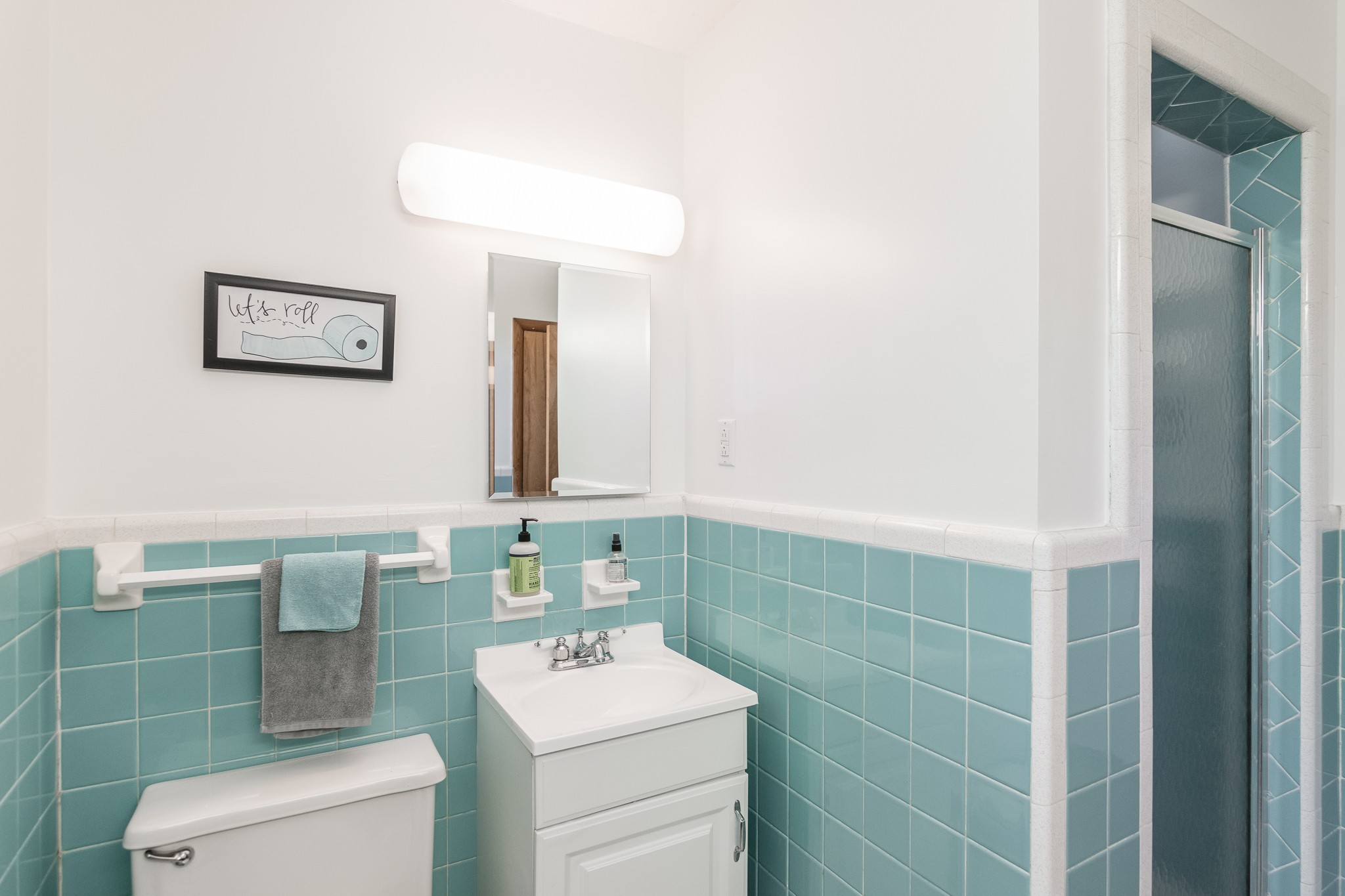 705 Ronnie Road Madison, TN 37115 - Photo 39 of 50 a bathroom with a toilet sink and mirror