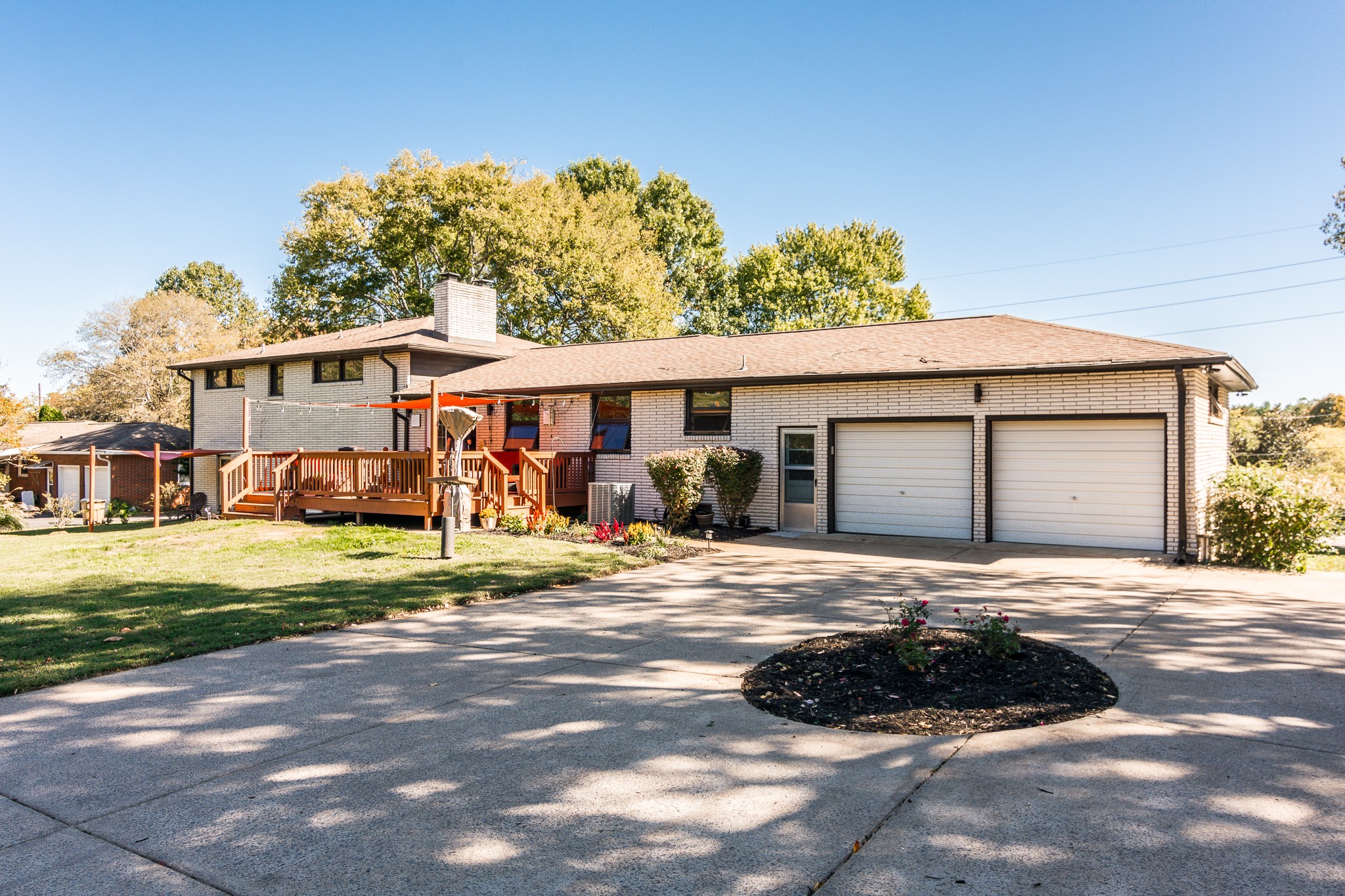 705 Ronnie Road Madison, TN 37115 - Photo 46 of 50 a front view of a house with a yard and garage