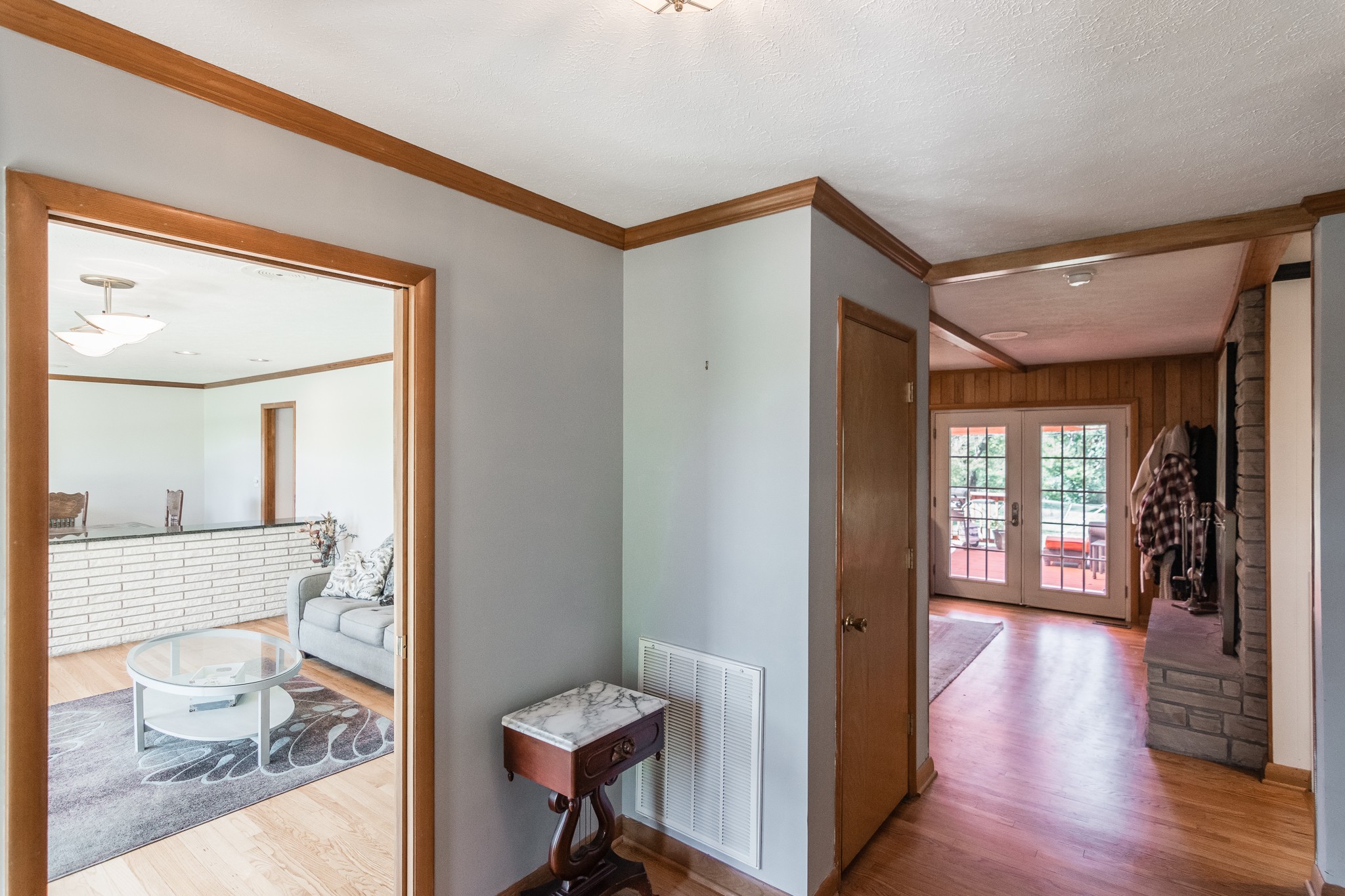 705 Ronnie Road Madison, TN 37115 - Photo 10 of 50 a view of a hallway with wooden floor and furniture