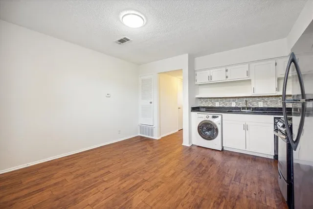 a view of a storage & utility room with washer and dryer