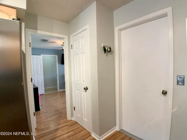 a view of a bathroom with a glass door