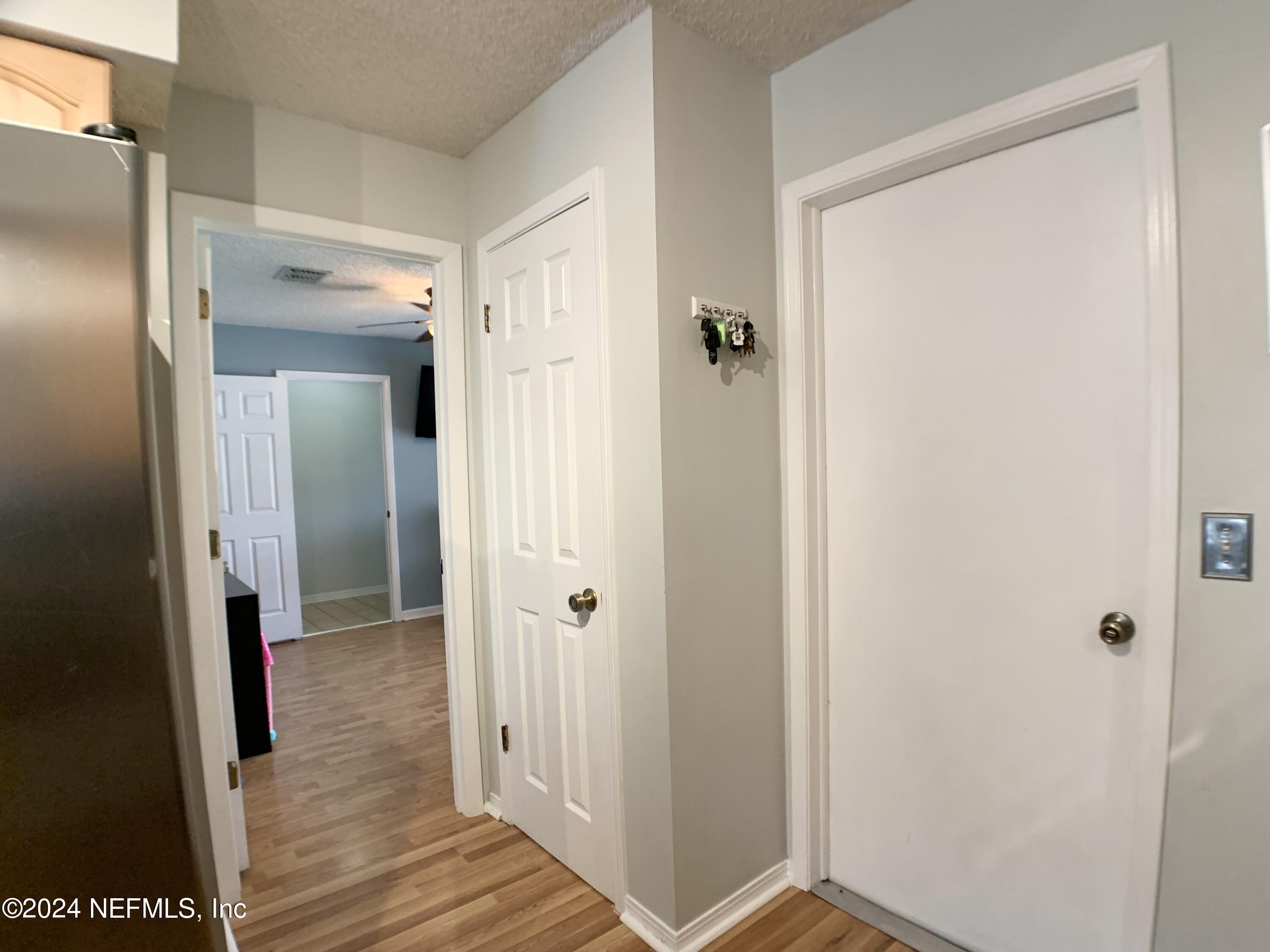 3149 Lakeside Villa Road Orange Park, FL 32073 - Photo 11 of 42 a view of a bathroom with a glass door