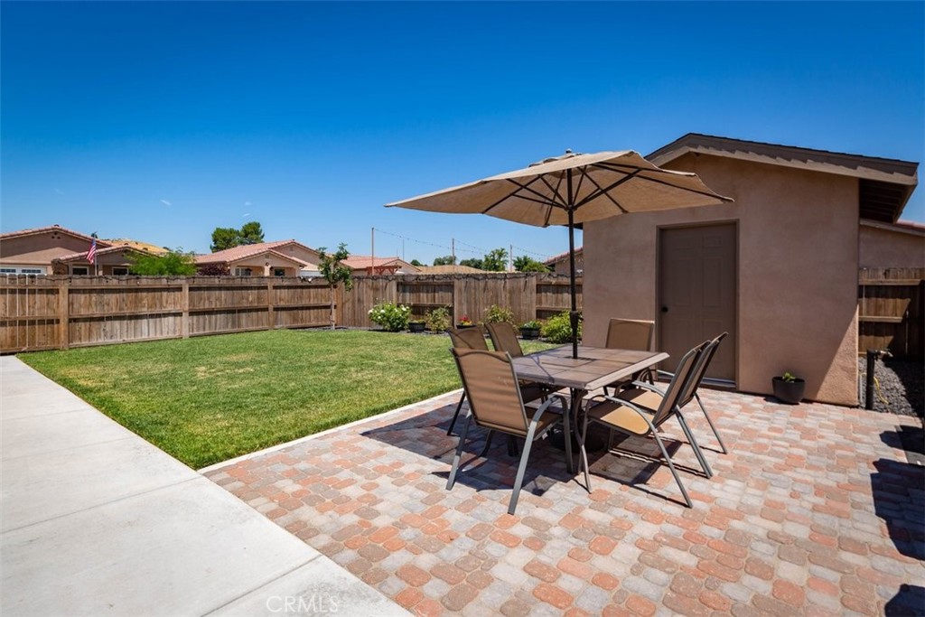 664 Chick Lane San Miguel, CA 93451 - Photo 11 of 14 a view of a backyard with a patio and outdoor seating