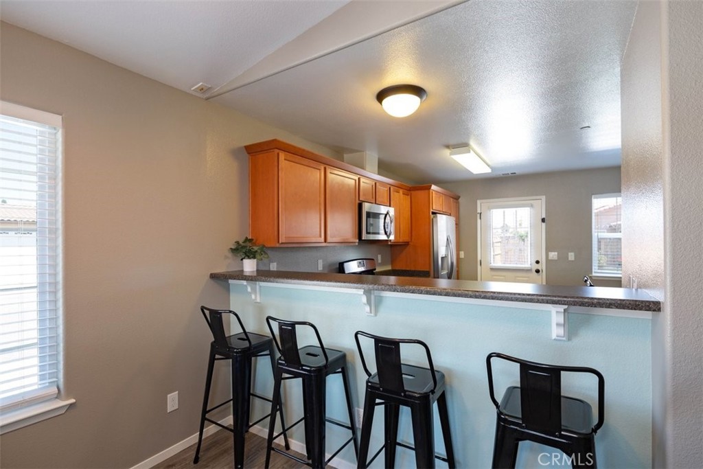 664 Chick Lane San Miguel, CA 93451 - Photo 2 of 14 a large kitchen with a table and chairs in it