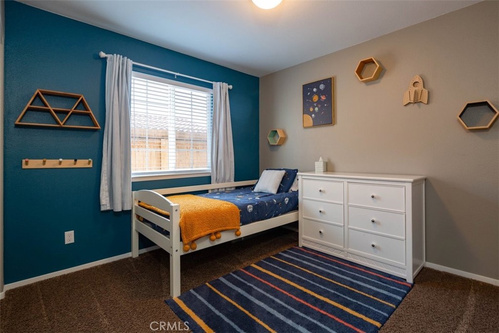 664 Chick Lane San Miguel, CA 93451 - Photo 4 of 14 a bedroom with a bed and a window